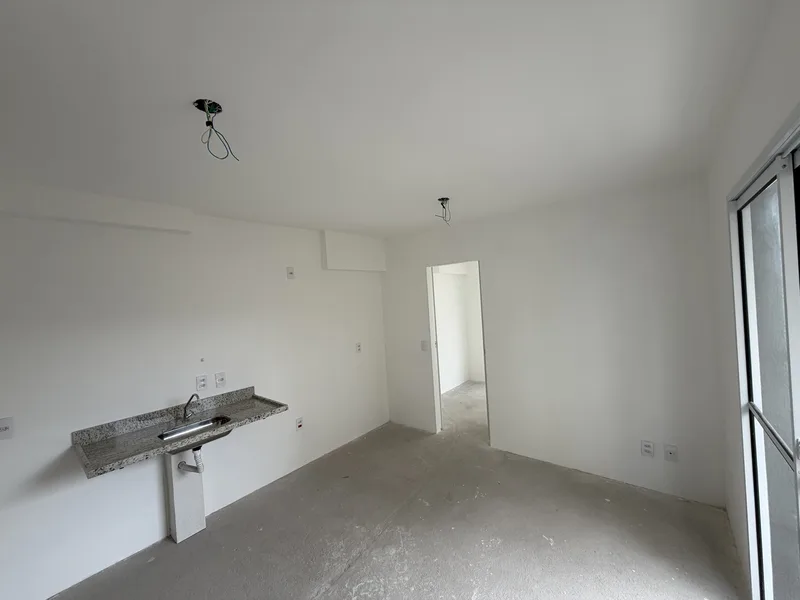 Apartamento 51: sala e cozinha — foto real de 26/09/2026