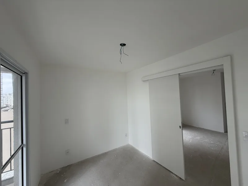 Apartamento 51: quarto com porta de correr — foto real de 26/09/2026